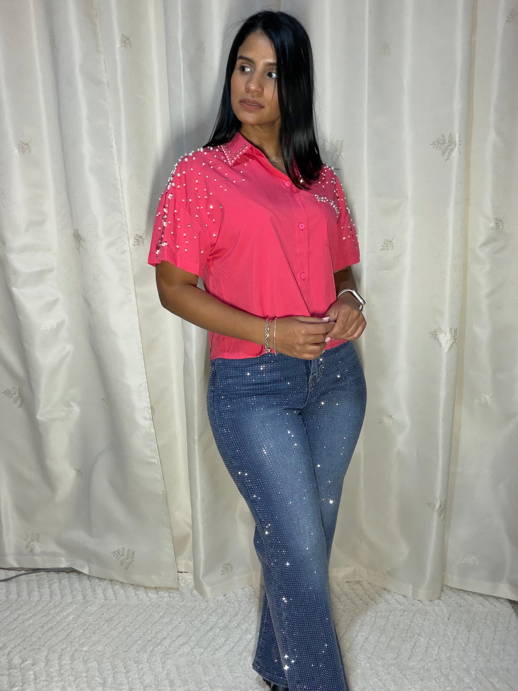 Blusa fuscia con perlas